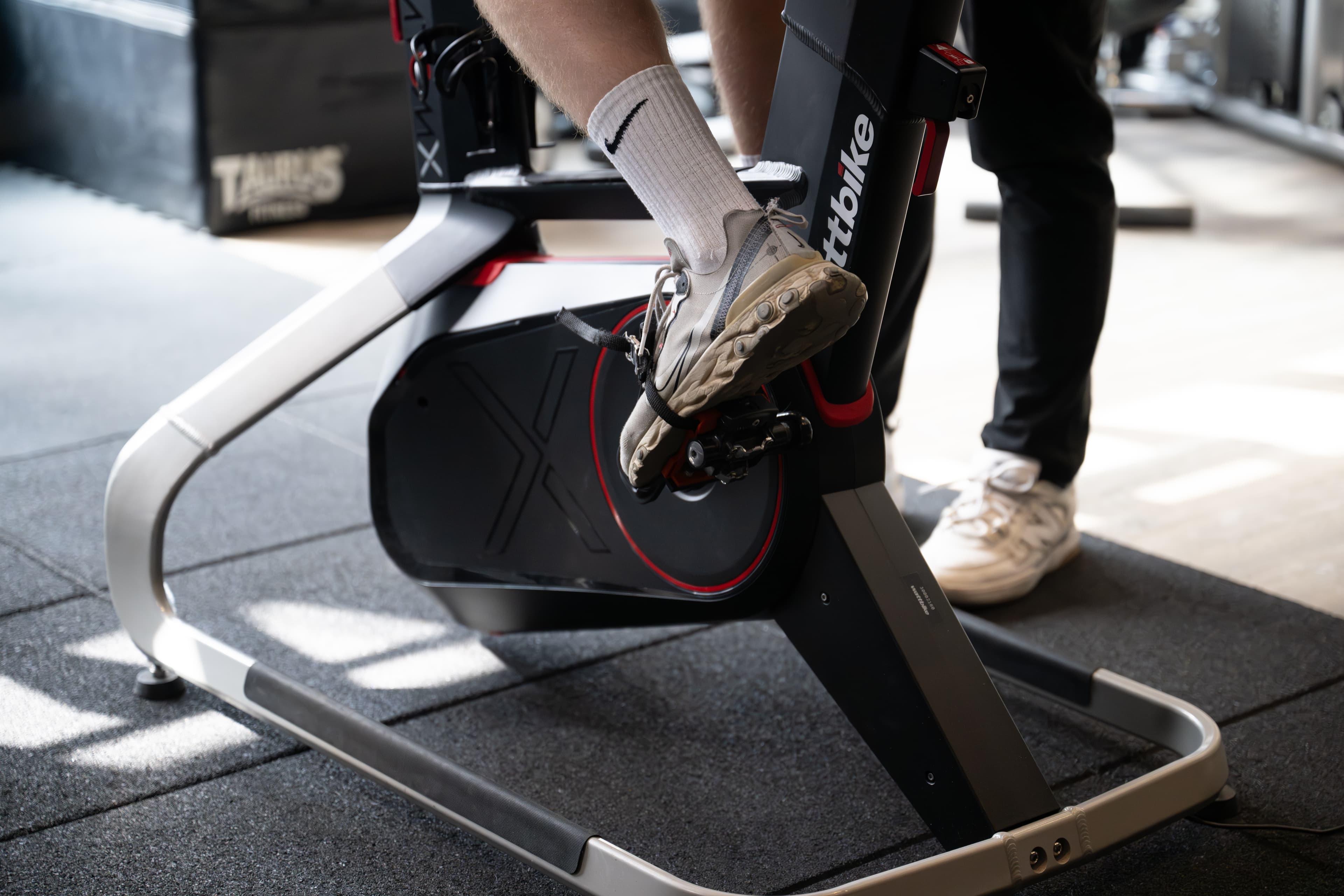 Person performing rehabilitation exercises under supervision in a physiotherapy clinic in Wokingham.